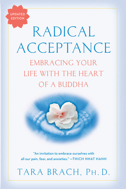 Book cover of Radical Acceptance: Embracing Your Life with the Heart of a Buddha (updated edition) by Tara Brach, Ph.D., featuring soft blue gradient background with gentle hands holding a blooming white lotus flower, blue and coral title text, red 'UPDATED EDITION' badge, and endorsement quote from Thich Nhat Hanh: 'An invitation to embrace ourselves with all our pain, fear, and anxieties