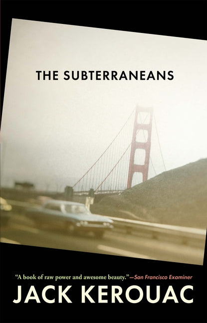 Book cover of The Subterraneans by Jack Kerouac, featuring a hazy, atmospheric photograph of the Golden Gate Bridge in fog with blurred cars on the roadway below, soft gray tones symbolizing San Francisco's underground Beat scene; bold black title 'THE SUBTERRANEANS' centered, author name at bottom, and praise quotes from San Francisco Examiner


